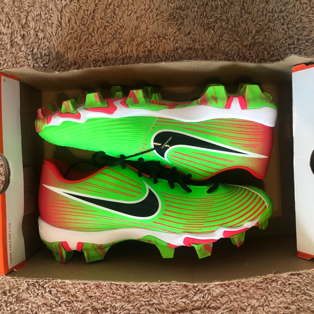 Womens softball cleats. Never worn. Size 9